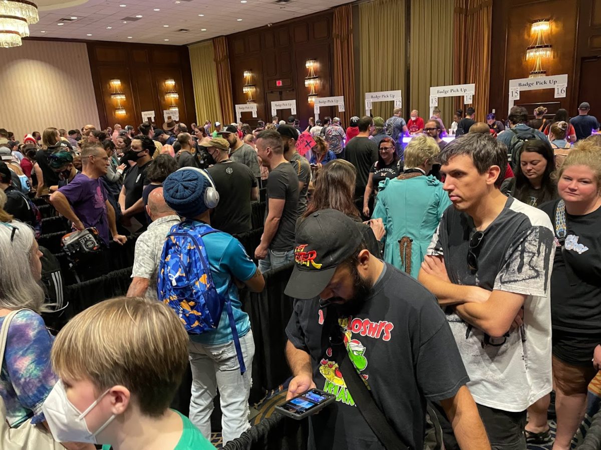 A snaking line of people in the Dragon Con badge pickup line.